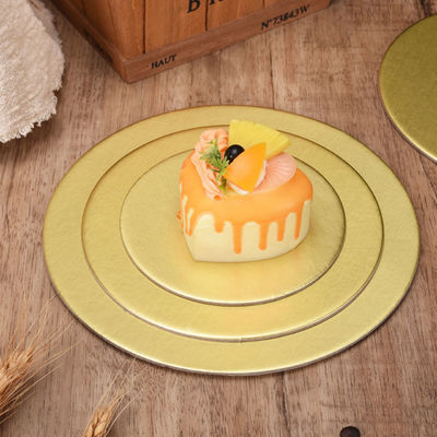 Tavole da torta dorata Cartone Alimenti e bevande Timbro di torta liscia Forma rotonda per negozio di torte