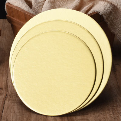 Tavole da torta dorata Cartone Alimenti e bevande Timbro di torta liscia Forma rotonda per negozio di torte
