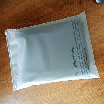 Custom Low MOQ Sacchetto di plastica con cerniera Sacchetto ristretto per abbigliamento Cerniera ghiacciata