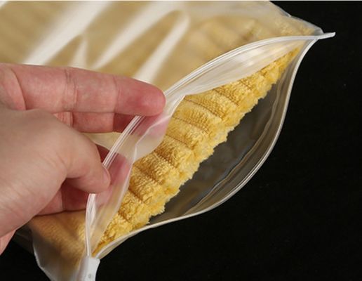 Chiusura e sacchetto a zip ecologici con valvola per abbigliamento con t-shirt stampato personalizzato